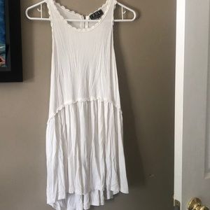 POL layered white tank top.